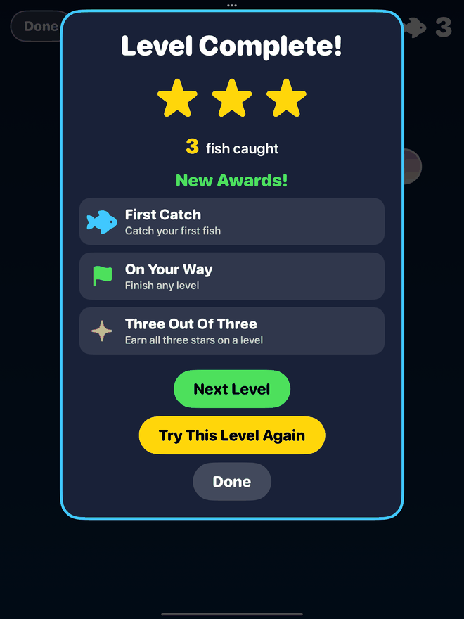 The end of a Fishing level: a card reading Level Complete with three big gold stars, three fish caught, three new awards named First Catch, On Your Way and Three Out Of Three, and large Next Level and Try This Level Again buttons.